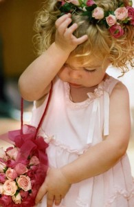 little flower girls hairstyle with head wreath with roses